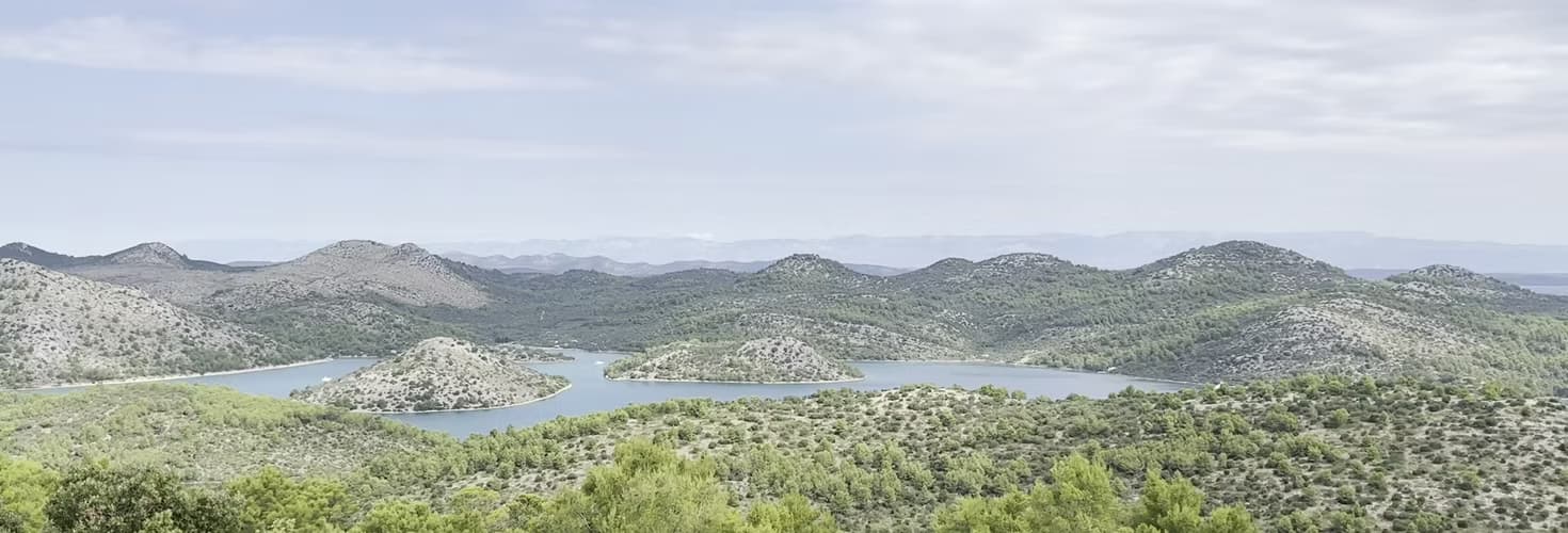 The untouched coastal landscape of Lorini Estate at dusk.
